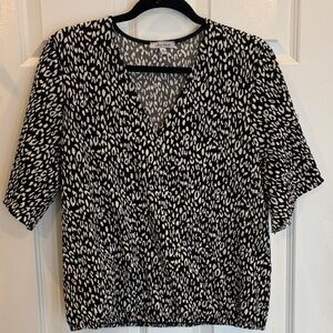White Birch black and white leopard v neck front wrap blouse